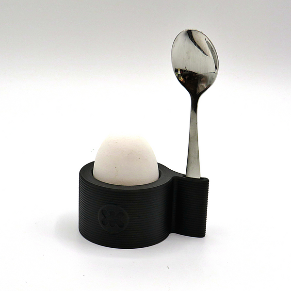 Egg cup with spoon shelf
